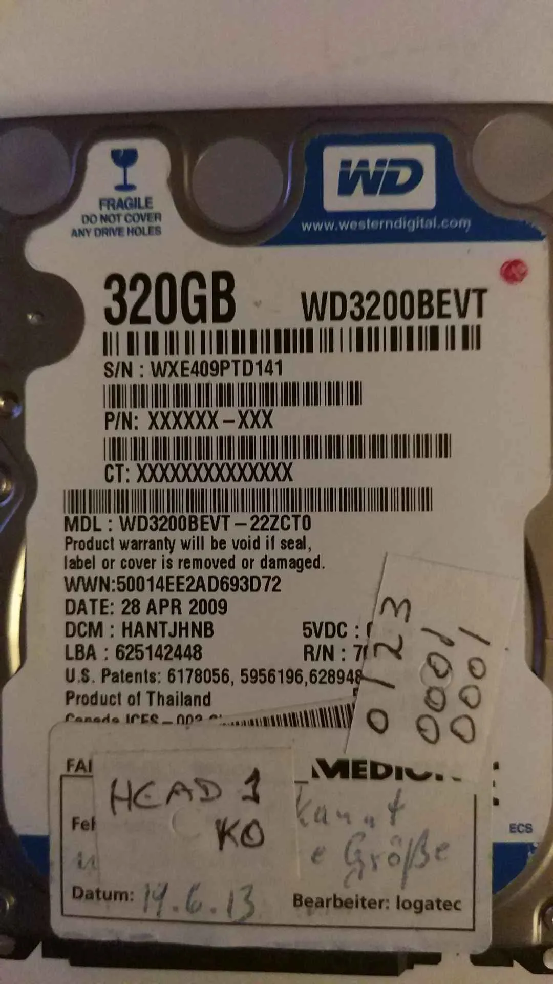 Western Digital WD3200BEVT-22ZCT0 S/N WXE409PTD141