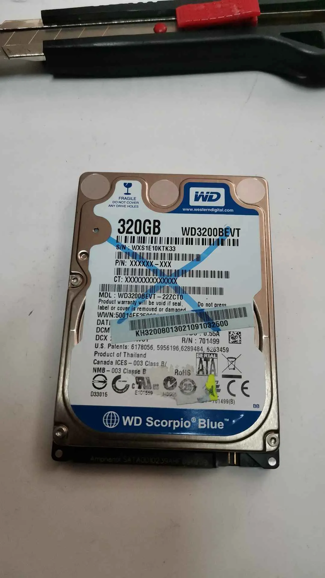 Western Digital WD3200BEVT-22ZCT0 S/N WXS1E10KTK33